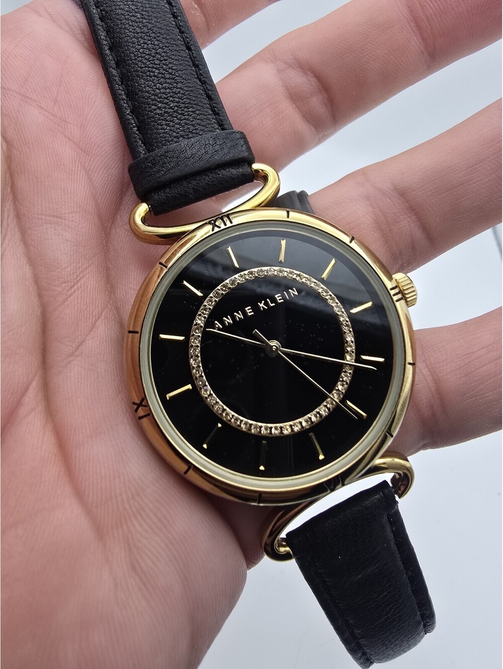Anne Klein Black And Gold Women's Watch Black Leather With Roman Numberal Case